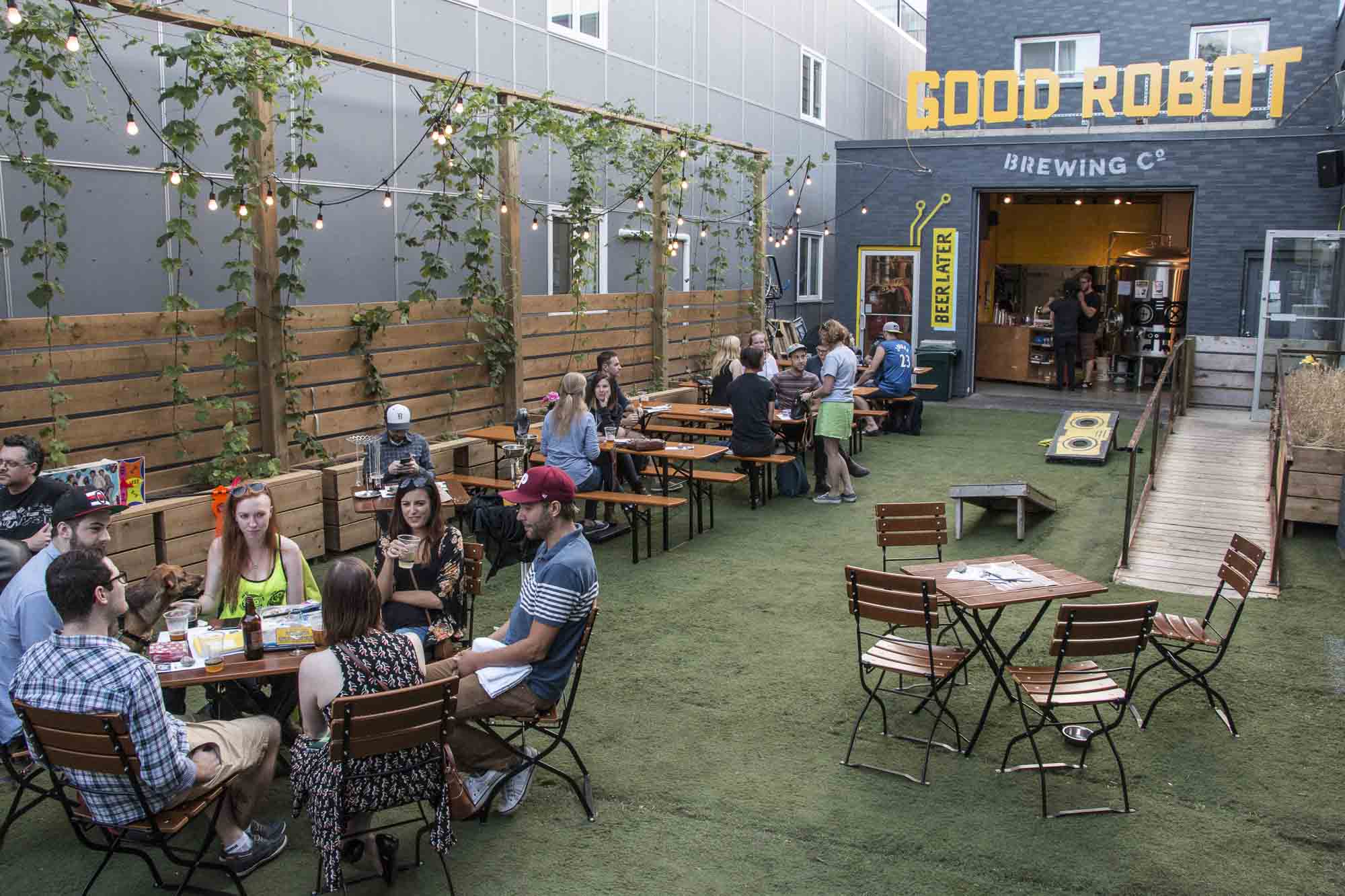 picture of Good Robot patio, with customers drinking in the sun